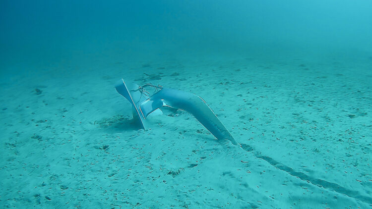 Anchor buried in sandy seabed