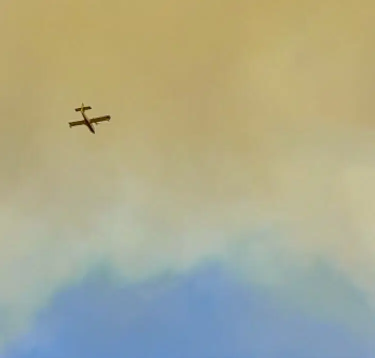 Attention - Forest Fire Danger: Firefighting Aircraft in Action